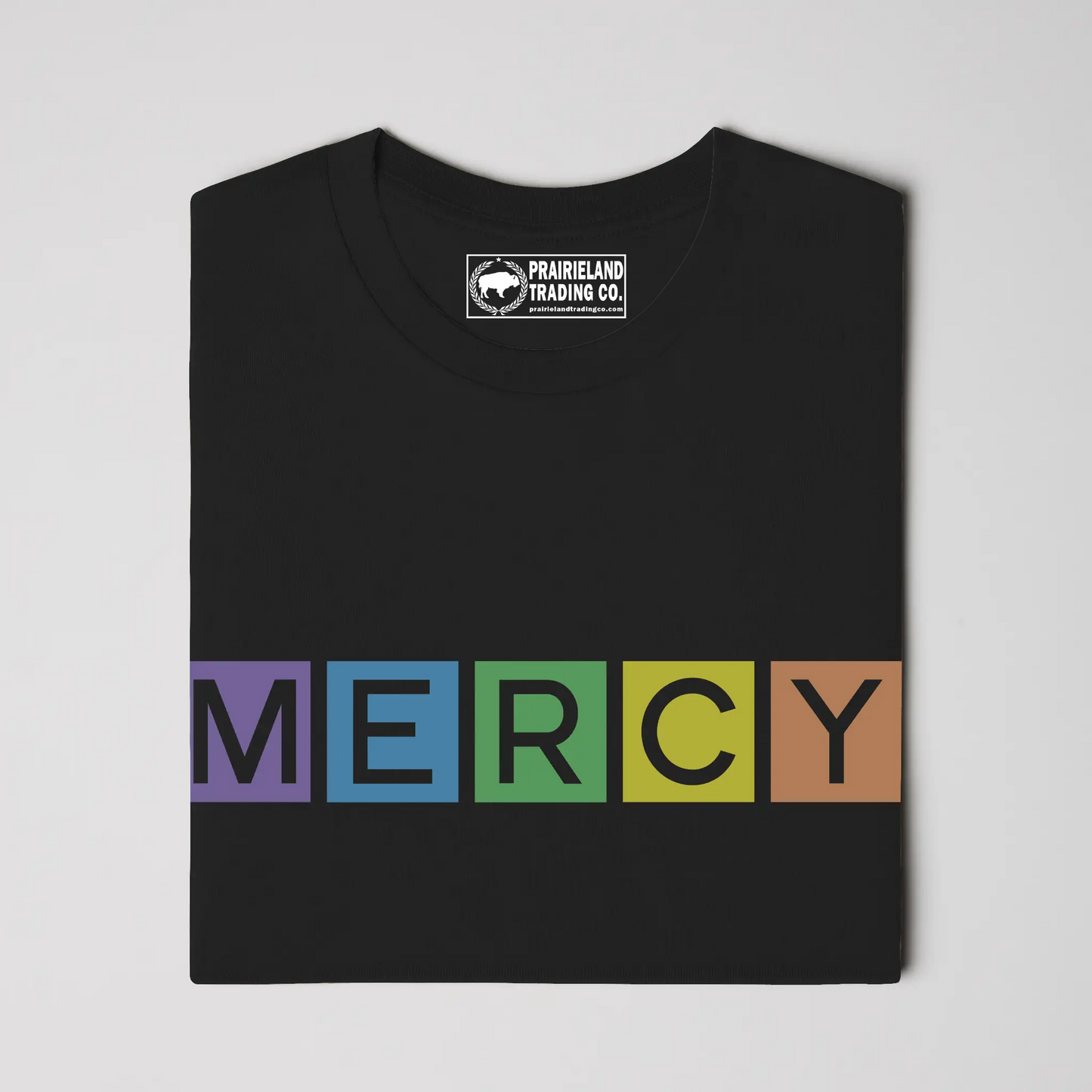 Colorful Mercy Christian T-Shirt – Rainbow-Inspired Faith Tee Reflecting Titus 3:5 & Psalm 103:8