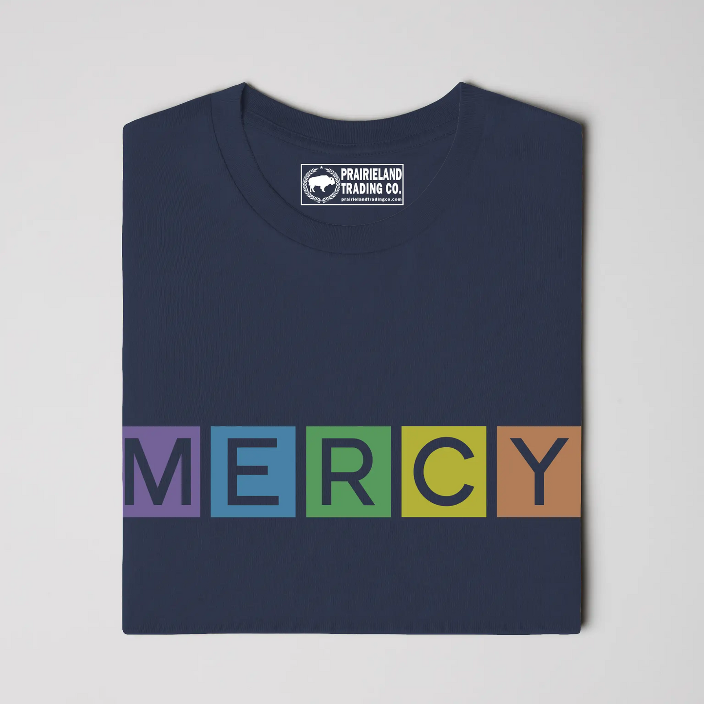 Colorful Mercy Christian T-Shirt – Rainbow-Inspired Faith Tee Reflecting Titus 3:5 & Psalm 103:8